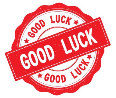 Kırmızı yuvarlak rozet yazılmış iyi şanslar metni.