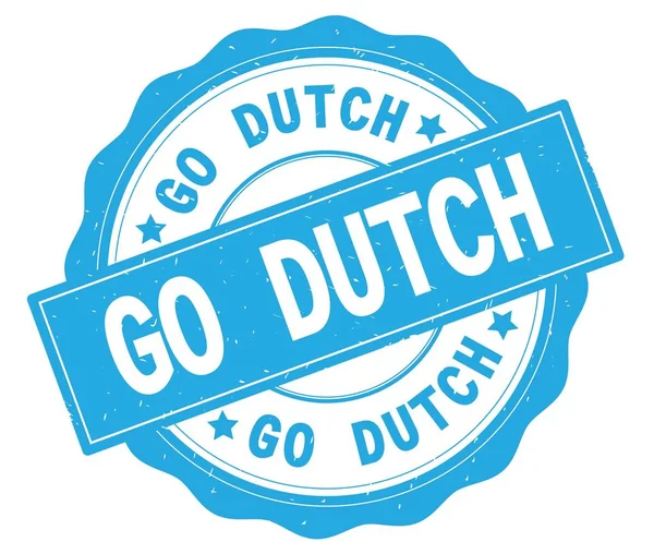 Текст GO DUTCH, написанный на голубом круглом значке . — стоковое фото