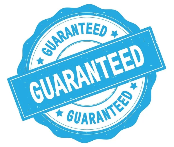 GUARANTEED text, written on cyan round badge. — Stock Photo, Image