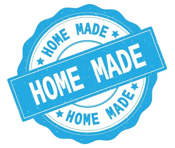 Home Made tekst, geschreven op cyaan ronde badge. — Stockfoto