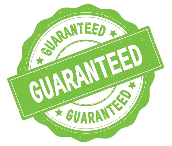 GUARANTEED text, written on green round badge. — Stock Photo, Image