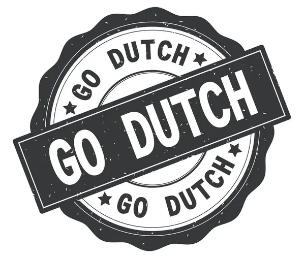 Текст GO DUTCH, написанный на сером круглом значке . — стоковое фото