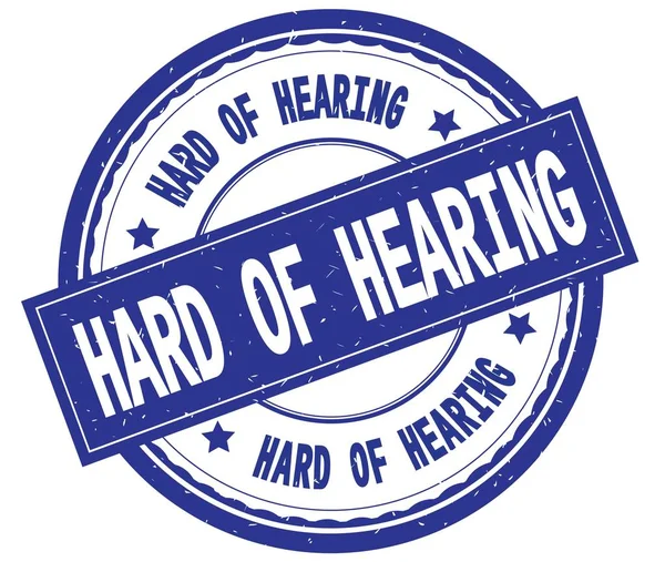 HARD OF HEARING, teks tertulis di cap karet bulat biru . — Stok Foto