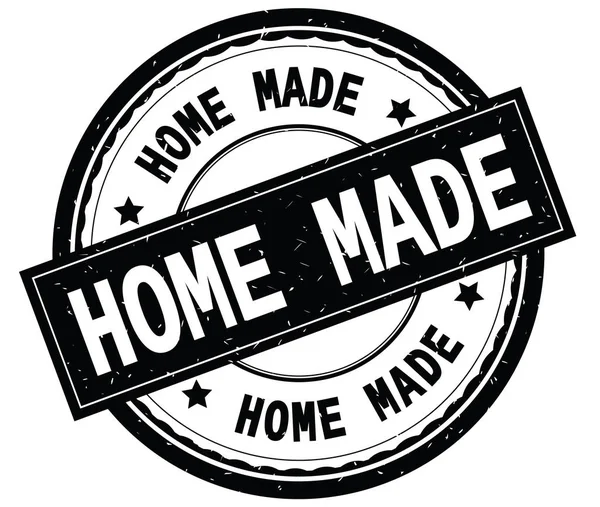 Home Made geschreven tekst op zwart ronde rubber stamp. — Stockfoto
