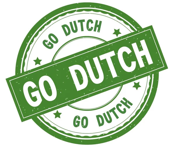 GO DUTCH, written text on green round rubber stamp . — стоковое фото