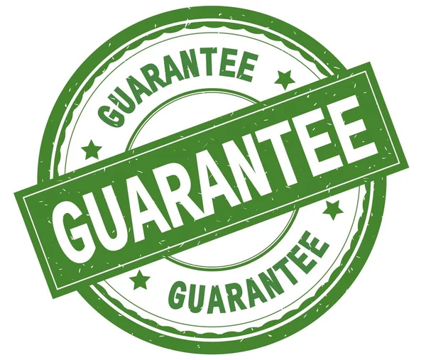 GUARANTEE , written text on green round rubber stamp. — Stock Photo, Image