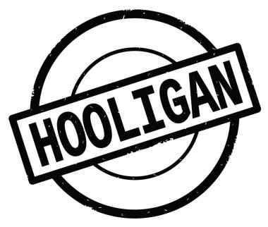 Holigan metin, siyah daire basit damga yazılmış.