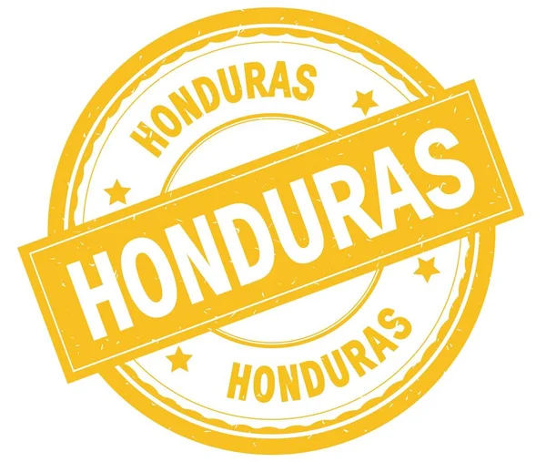 Honduras, skriven text på gula runda gummistämpel. — Stockfoto