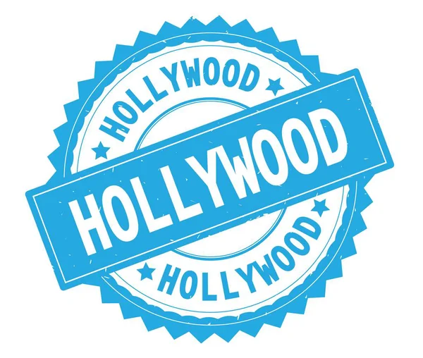 HOLLYWOOD blue text round stamp, with zig zag border. — Stock Photo, Image