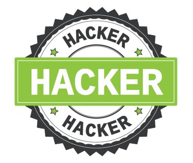 Hacker gri ve yeşil yuvarlak damga, zig zag kenarlıklı metin.
