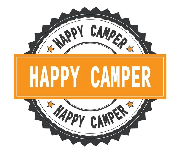 HAPPY CAMPER teksti harmaa ja oranssi pyöreä leima, jossa siksak — kuvapankkivalokuva
