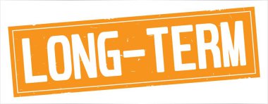 Tam turuncu dikdörtgen damga üzerinde uzun vadeli metin.