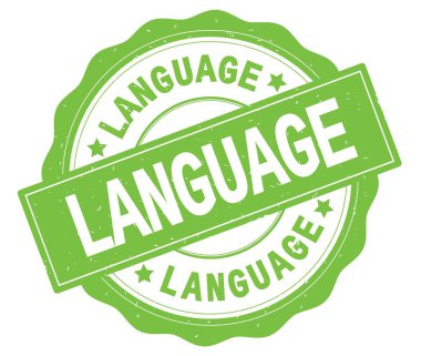 Yeşil yuvarlak rozet yazılı dilde metin.