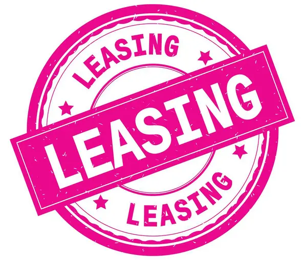 Leasing, geschriebener Text auf rosa rundem Gummistempel. — Stockfoto