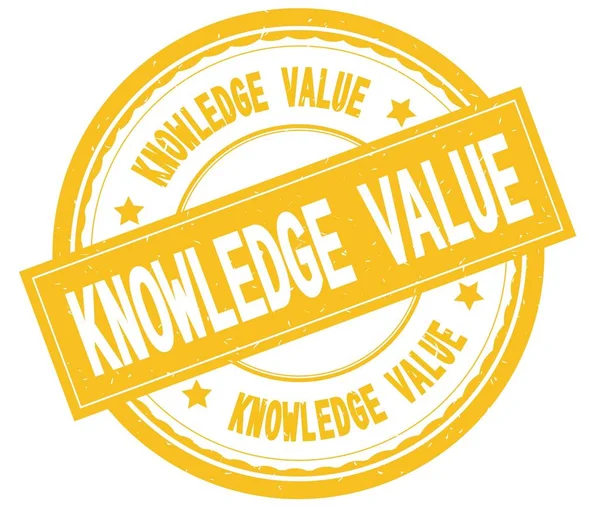 Αξία γνώσης, γραπτό κείμενο σε κίτρινο στρογγυλό καουτσούκ σφραγίδα. — Φωτογραφία Αρχείου
