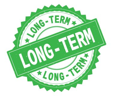 Uzun vadeli yeşil metin damgası, zig zag kenarlıklı yuvarlak.