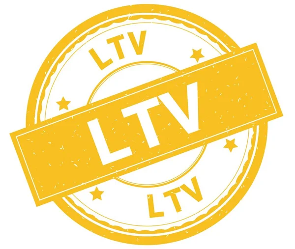 LTV, texte écrit sur timbre caoutchouc rond jaune . — Photo