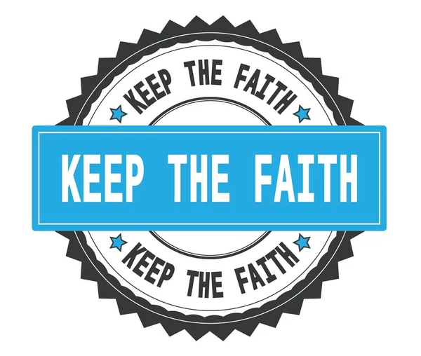 Текст KEEP THE FAITH на сірій та блакитній круглій марці, з зигзагом b — стокове фото