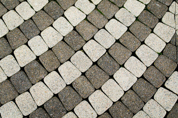 Tile Paving. Small, square tiles laid in the form of a circle