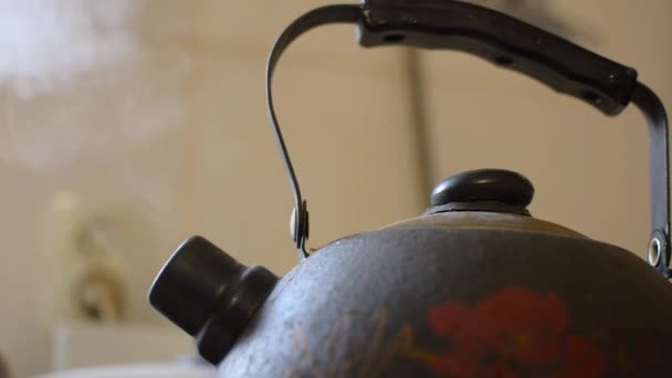 Old boiling kettle on a gas stove — Stock Video