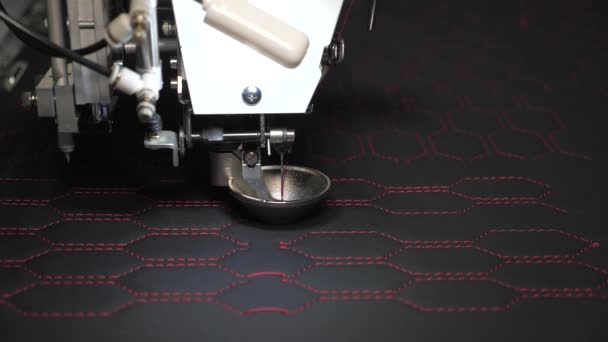 Automated machine embroidery. Robotics with cnc works in the sewing production line. Robot sewing machine. computer controls sewing machine. automatic sewing machine. Slow motion — Stock Video