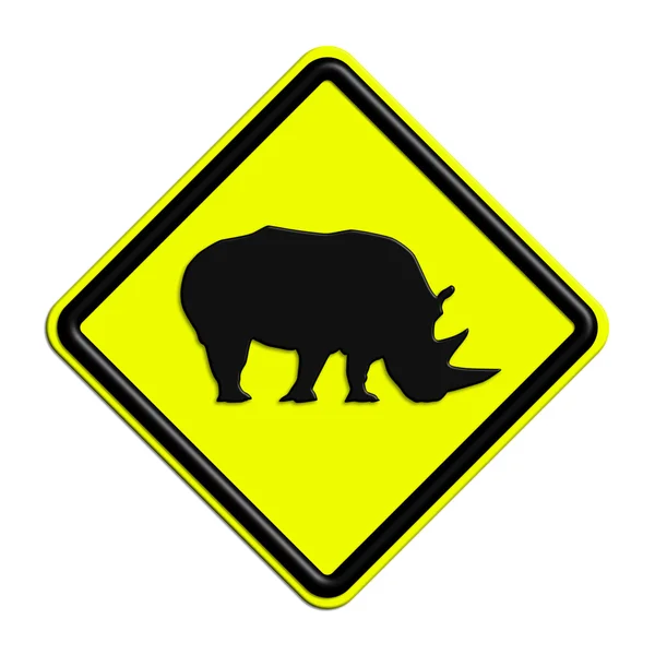 Warning or black and yellow caution sign with rhino — ストック写真