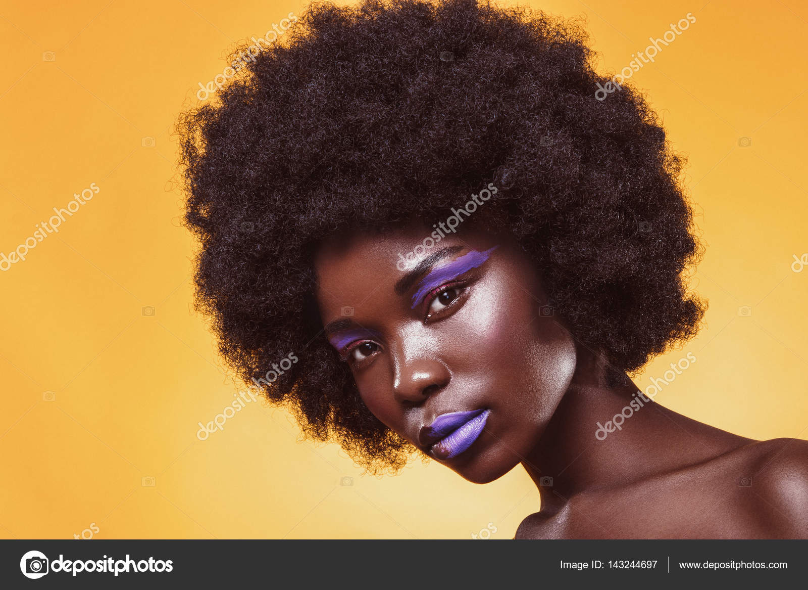 Fashion Woman With A Short Haircut And Black Skin Posing In