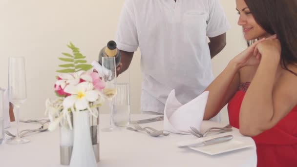 View Lovely Couple Enjoying Time Together While Waiter Pouring Champagne — Stock Video