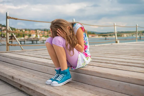 Girl Sitting Ocean Worrying Family Problems stockfoto