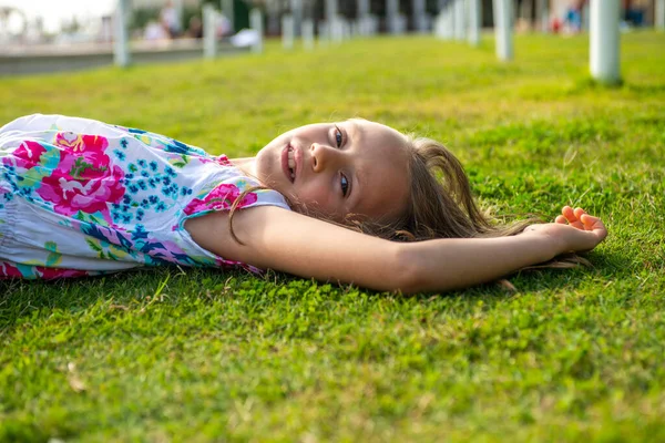 Medium Close Girl Relaxing Grass — kuvapankkivalokuva