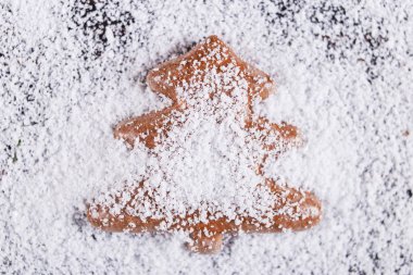 Christmas concept background, handmade gingerbread in the shape 