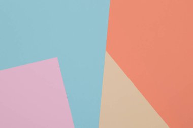 Mavi, sarı, turuncu ve pembe arkaplan, renkli kağıt geometrik olarak bölgelere bölünür, çerçeve, boşluk kopyala.