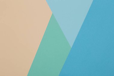 Mavi, yeşil, sarı arkaplan, renkli kağıt geometrik olarak bölgelere bölünür, çerçeve, boşluk kopyala.