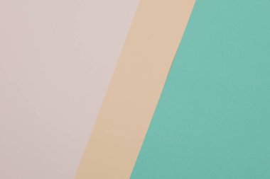 Yeşil, sarı arkaplan, renkli kağıt geometrik olarak bölgelere bölünür, çerçeve, boşluk kopyala.