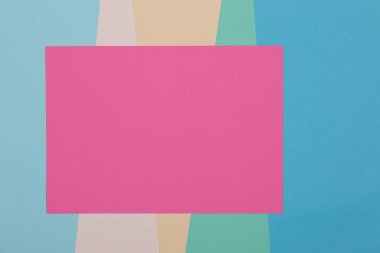 Mavi, yeşil, sarı ve pembe arkaplan, renkli kağıt geometrik olarak bölgelere bölünür, çerçeve, boşluk kopyala.