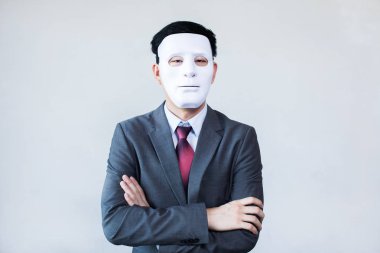 Businessman in disguise mask in white background clipart