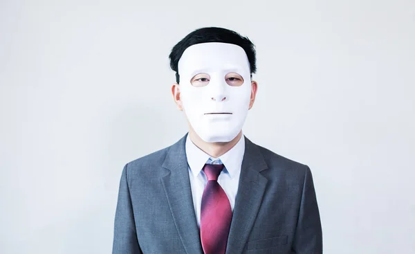 Zakenman in vermomming masker op witte achtergrond — Stockfoto