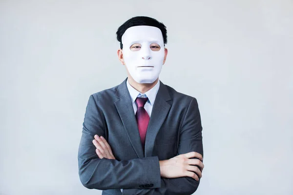 Zakenman in vermomming masker op witte achtergrond — Stockfoto