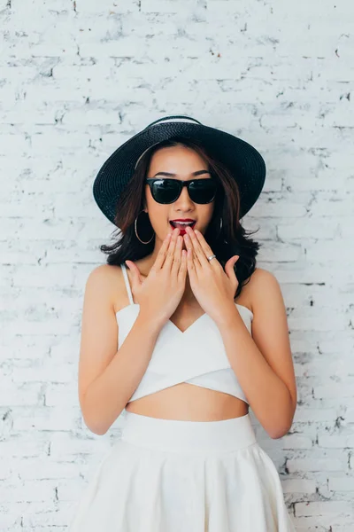 Young Woman Giving Surprise Look Fashionable Sunglasses Summer Hat White — Stock Photo, Image