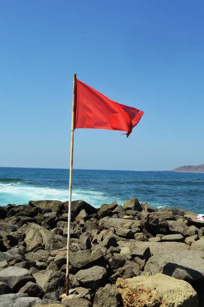 Red warning  flag — Stock Photo, Image
