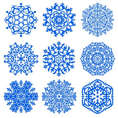 Dokuz farklı etnik tasarım, tasarım için madalyonlar. Broşür ve kartpostal tasarımı için dokuz vektör kar tanesi. Kafkas Motifleriyle Vektör Süslemesi.
