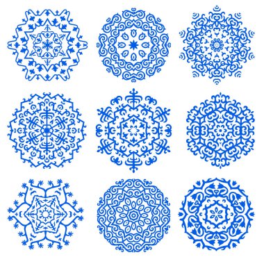 Dokuz farklı etnik tasarım, tasarım için madalyonlar. Broşür ve kartpostal tasarımı için dokuz vektör kar tanesi. Kafkas Motifleriyle Vektör Süslemesi.