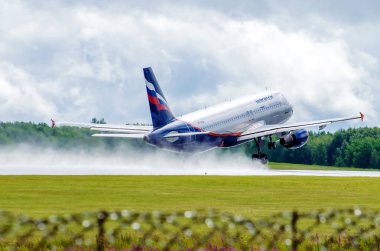 Russia city Tumen, airport Ros chino, take off airbus a320 aeroflot, 27 July 2014 clipart