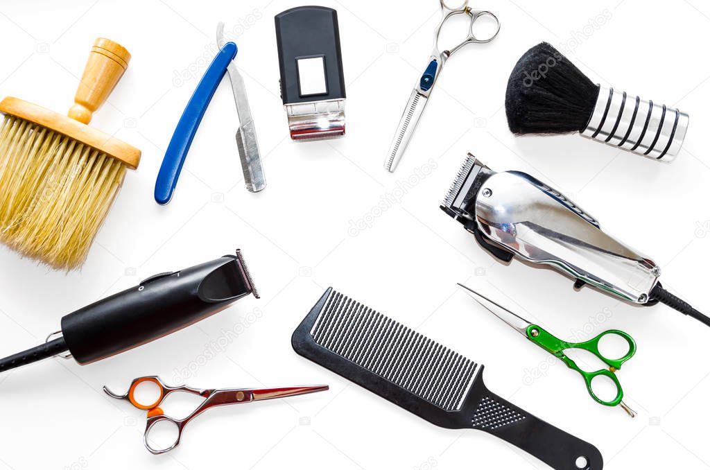Barber shop equipment tools on white background. Professional hairdressing tools. Comb, scissor, clippers and hair trimmer isolated. 