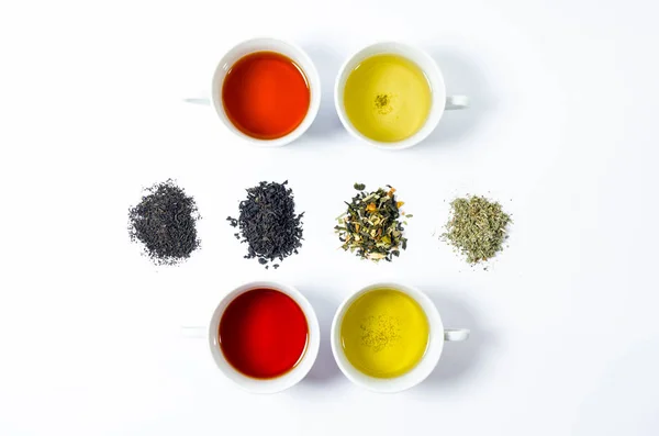 Gyűjtemény a különböző teákat csésze tea hagy egy fehér háttér — Stock Fotó