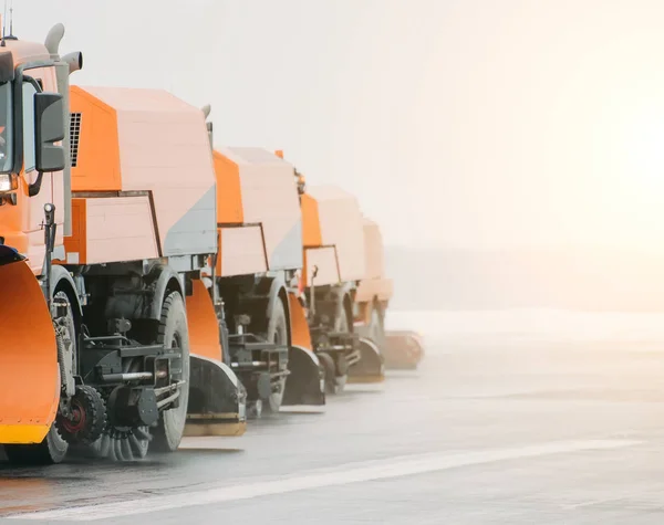 Snow-removing machine, on roads cleaning snow.