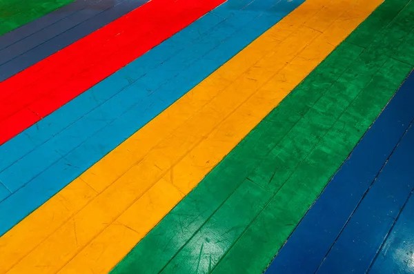 Suelo de arco iris textura de madera, esquina de los niños — Foto de Stock