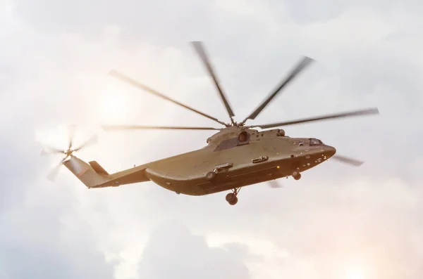 Large transport cargo helicopter is flying in the sky — Stock Photo, Image