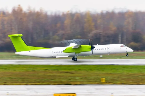 Turboprop airplane aircraft take off departure at the airport. — Stock Photo, Image