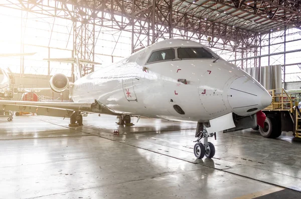 Passenger aircraft in the hangar on service. — Stock Photo, Image